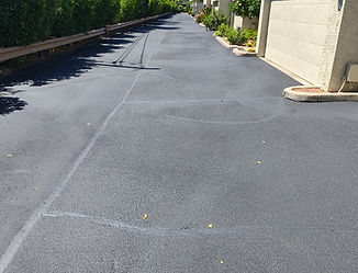 Gallery image 3 — overlay asphalt Spray It Right Sealcoating and Striping llc (ROC#373975)