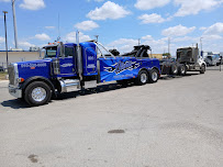 roadside assistance Alanis Wrecker Service photo