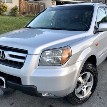 Yoshi: Comprehensive Car Wash & Oil Change Services
